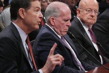 WASHINGTON, DC - SEPTEMBER 10:  (L-R) FBI Director James Comey, CIA Director John Brennan and Director of National Intelligence James Clapper testify about "World Wide Cyber Threats" during an open hearing of the  House (Select) Intelligence Committee at the U.S. Capitol Visitors Center September 10, 2015 in Washington, DC. Clapper said that the budget uncertainty of sequestration has posed a challenge to how the United States faces cyber attacks from countries like China that could undermine U.S. economic competitiveness and national security.  (Photo by Chip Somodevilla/Getty Images)